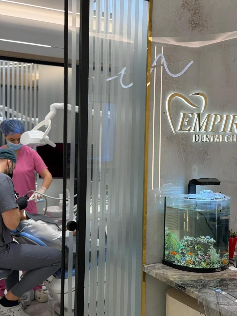 Dr. Gersi working at Empire Dental Clinic